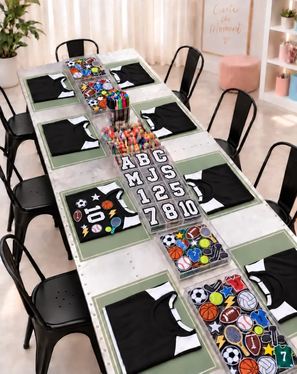 Jerseys and sports-themed patches laid out for an all-star jersey decorating activity