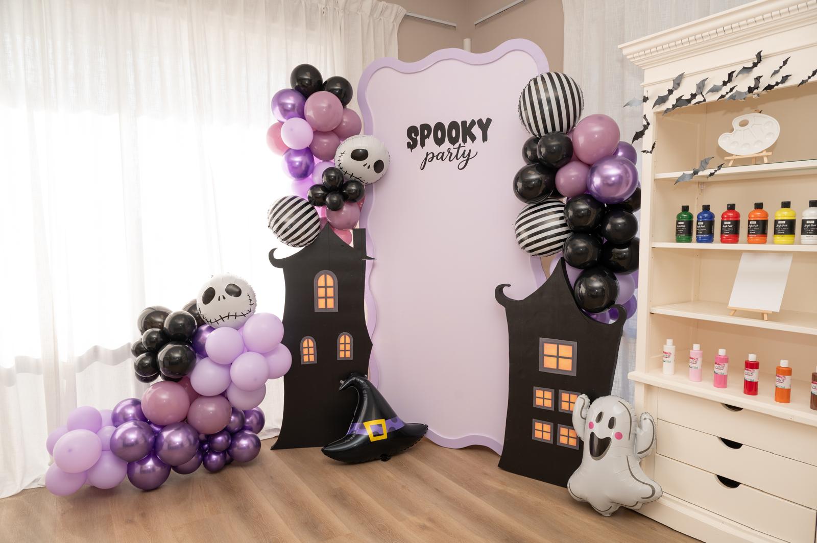 Studio celebration backdrop with balloons and decorations