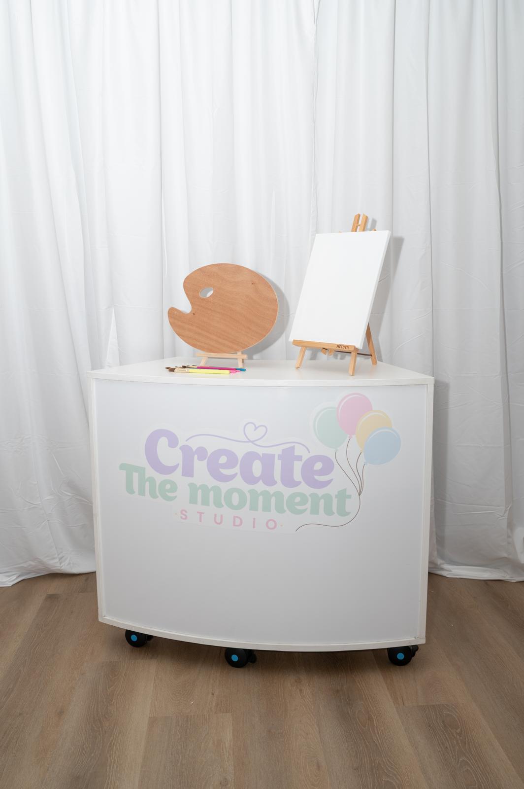 Create the Moment Studio welcome cart at the entrance
